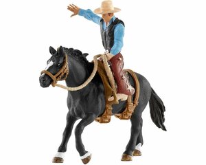Schleich® Spielfigur »Schleich 41416 Saddle bronc riding mit Cowboy«
