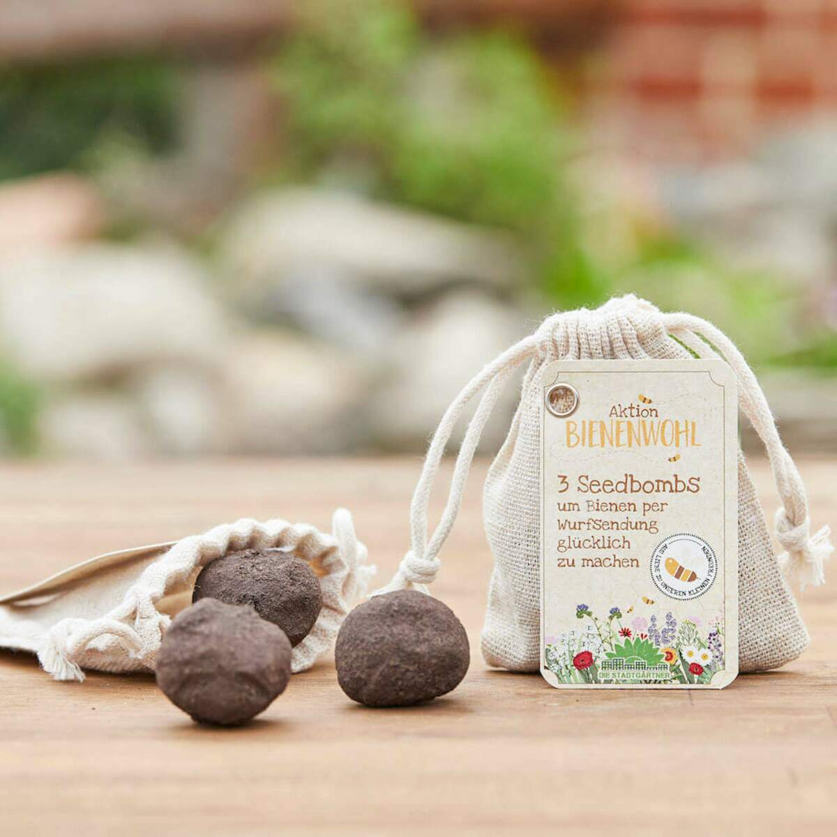 Bild 2 von Die Stadtgärtner
              
                 BIENENWOHL 3ER SEEDBOMBS