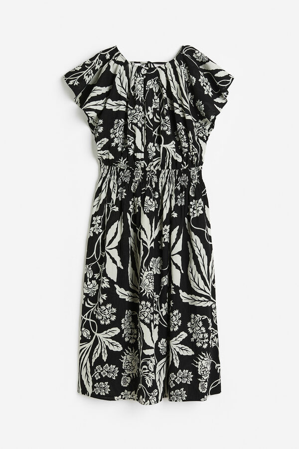 Bild 1 von H&M Gecrinkeltes Baumwollkleid Schwarz/Gemustert, Alltagskleider in Größe XL. Farbe: Black/patterned
