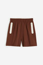 Bild 1 von H&M DryMove™ Sportshorts Dunkelbraun in Größe 146/152. Farbe: Dark brown