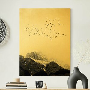 Leinwandbild Vogelschwarm vor Bergen von Boris Draschoff