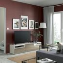 Bild 3 von BESTÅ  TV-Bank mit Schubladen und Tür, weiß/Riksviken hell bronzefarben 180x42x39 cm