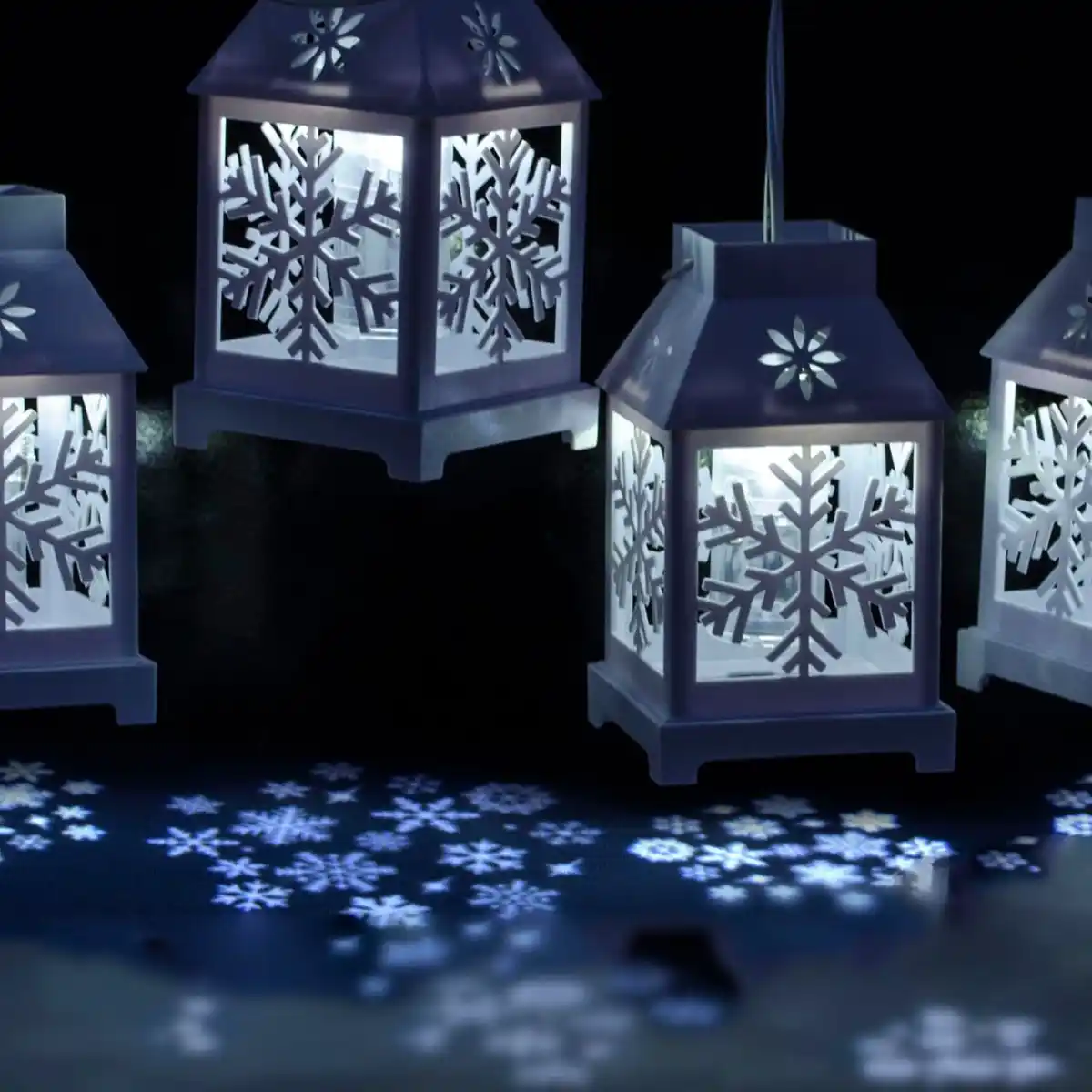 Bild 3 von X4-LIFE LED Laternen Lichterkette mit Schneeflocken Projektion