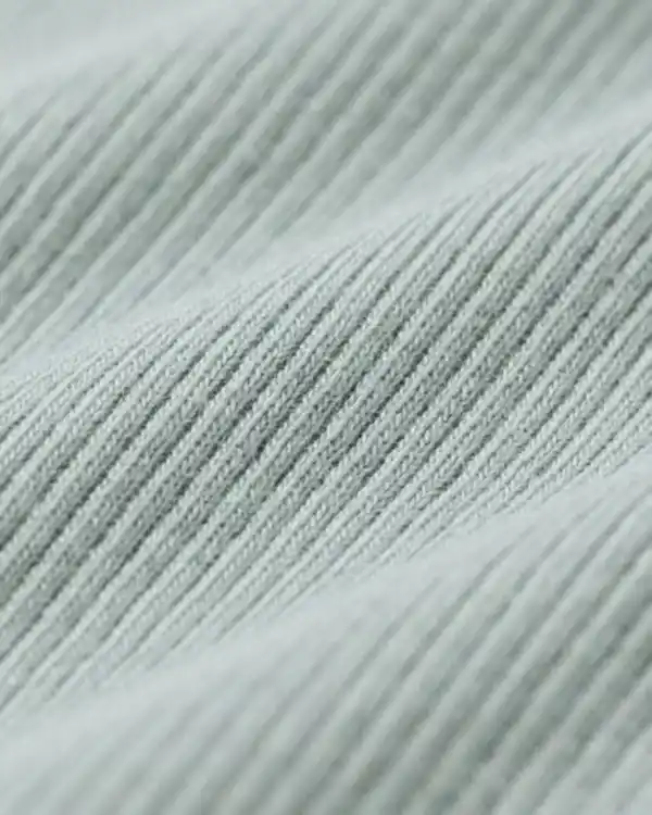 Bild 2 von größenflexibler Newborn-Wickelbody, Feinripp, mit Bambus/Elasthan grün