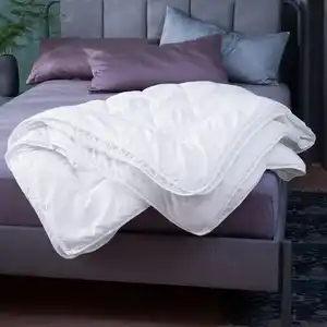 4-Jahreszeiten-Steppbett mit Rautensteppung