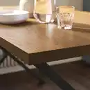 Bild 4 von SKÅLSTA Tisch und 4 Stühle, Nussbaumnachbildung x-förmig schwarzgrau/Kunststoff schwarz profiliertes Metall/schwarzgrau, 140x80 cm