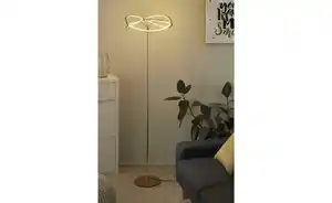 Trio LED-Stehleuchte, messing-matt, geschwungen Charivari