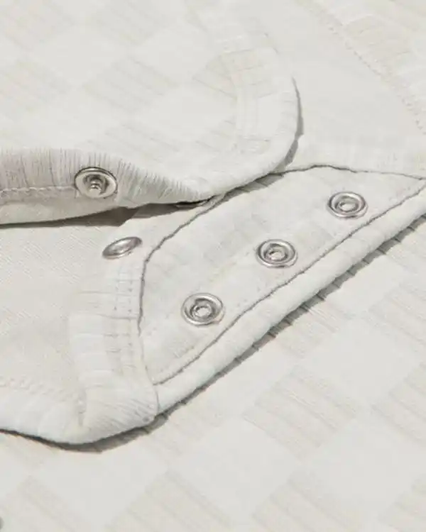 Bild 3 von Mitwachsender Baby-Strampler LENZING™ ECOVERO™, gerippt, Blockmuster blau