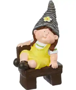 Gartenfigur Kind auf Bank, gelb