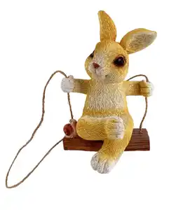 Gartenfigur Hase auf Schaukel, braun