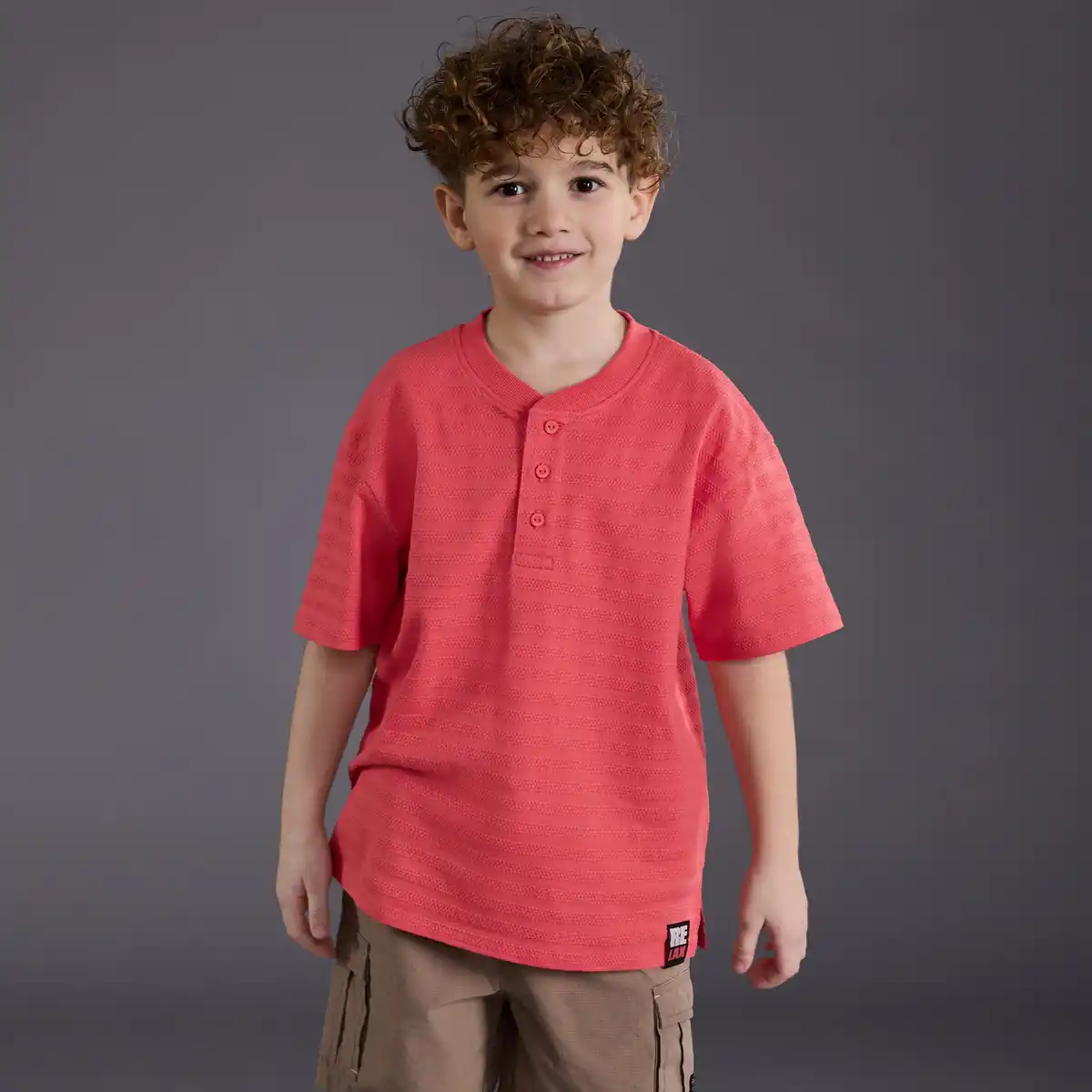 Bild 1 von Kinder-Jungen-T-Shirt mit kurzer Knopfleiste