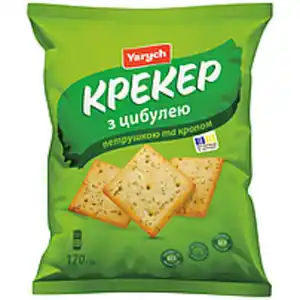 Kräcker mit Zwiebeln, Petersilie und Dill.