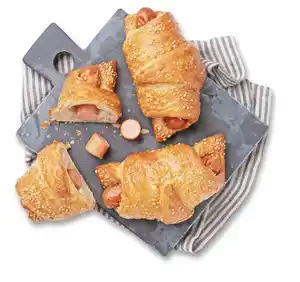 Croissant mit Geflügelwürstchen, Stück
